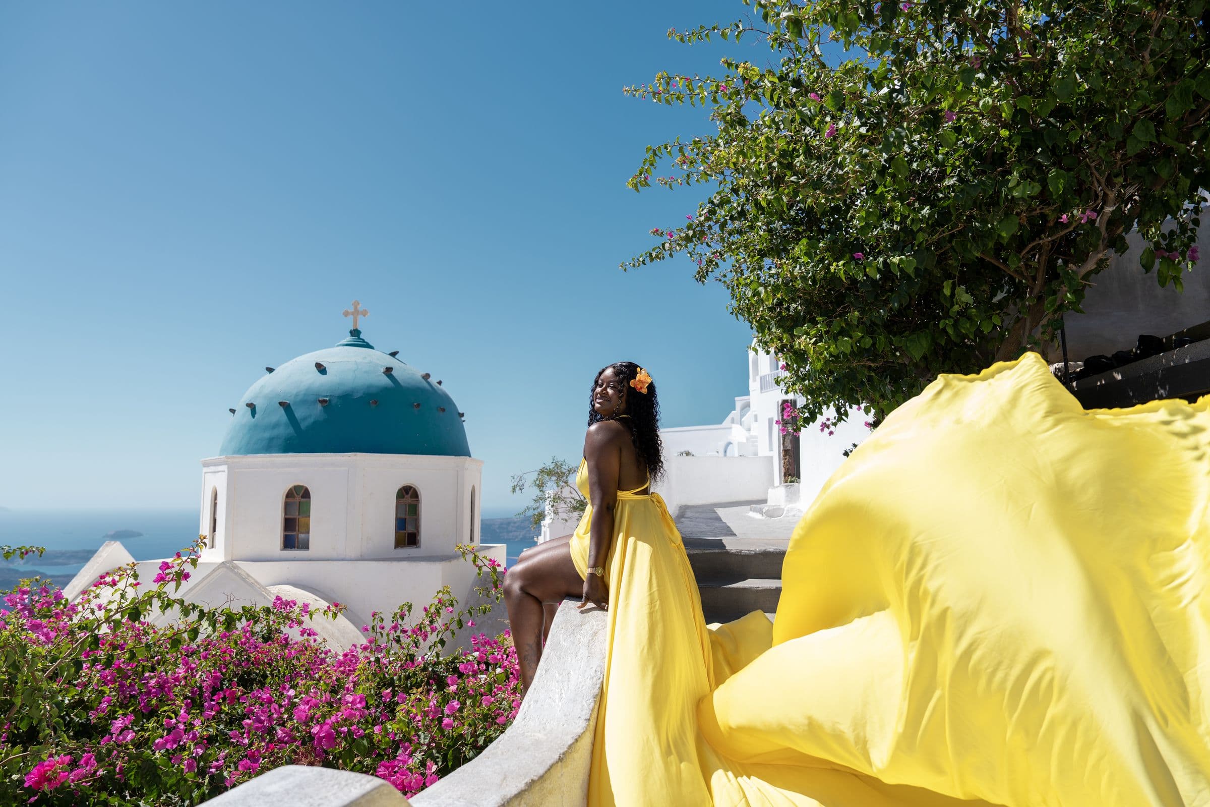 Flying dress session in the caldera of Santorini